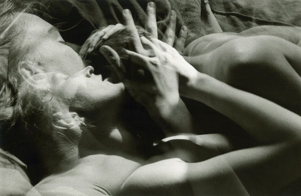Double Exposure of Couple Making Love