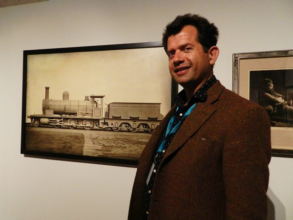 Roland Belgrave with his carbon print of a locomotive by James Mudd. (Photo by Michael Diemar)