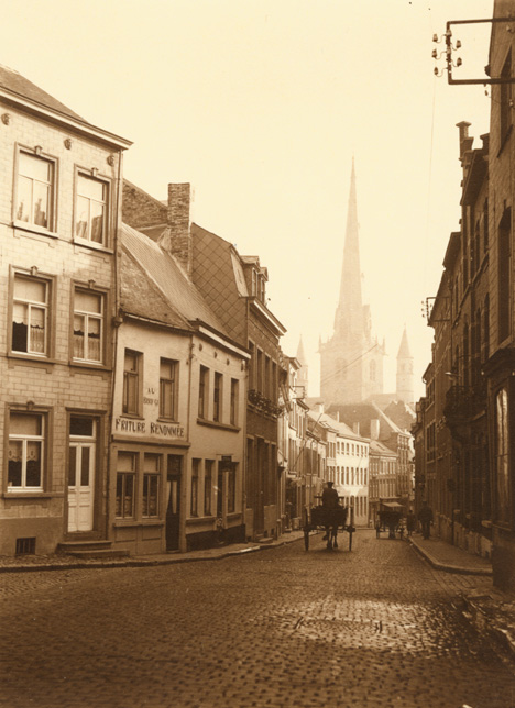 Leonard Misonne - A Cobblestone Street with Horse Carriages in Nivelles, Belgium Leonard Misonne - A Cobblestone Street with Horse Carriages in Nivelles, Belgium