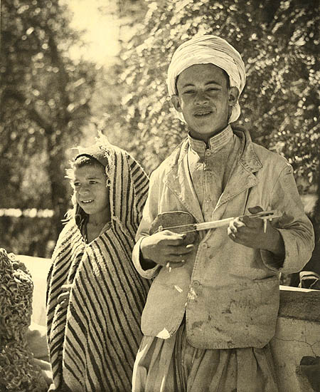 Laure Albin-Guillot - Algerian Boy with String Instrument and Girl Laure Albin-Guillot - Algerian Boy with String Instrument and Girl