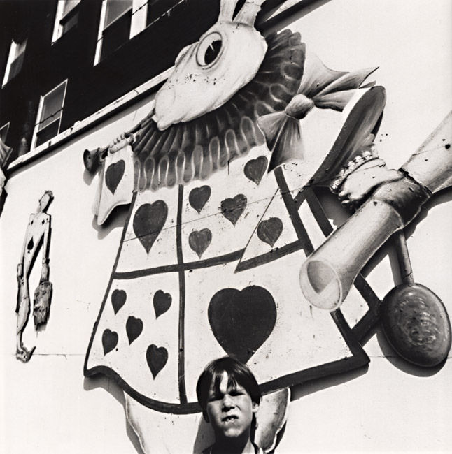 Arthur Tress - Boy with Picture of Alice's Rabbit in Rockaway Playland, Queens, NY Arthur Tress - Boy with Picture of Alice's Rabbit in Rockaway Playland, Queens, NY