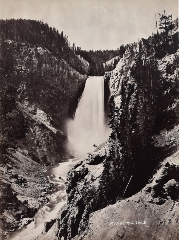 William Henry Jackson: Lower Yellowstone Falls. Albumen print from wet plate negative, 12-15/16 x 9-13/16 in. (330 x 250 mm), 1880c, on original mount. Title reversed out of the negative at the lower right of the image. Photographer's name and date in pencil at lower left below image on the mount. (Estimate $1,200-$1,500)