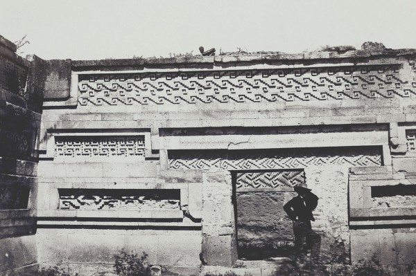 Claude-Joseph-Desire Charnay: Self Portrait, Interior Courtyard, Great Palace, Mitla. Albumen print from wet plate negative, 10-1/4 x 15-1/2 in. (260 x 394 mm), 1859.